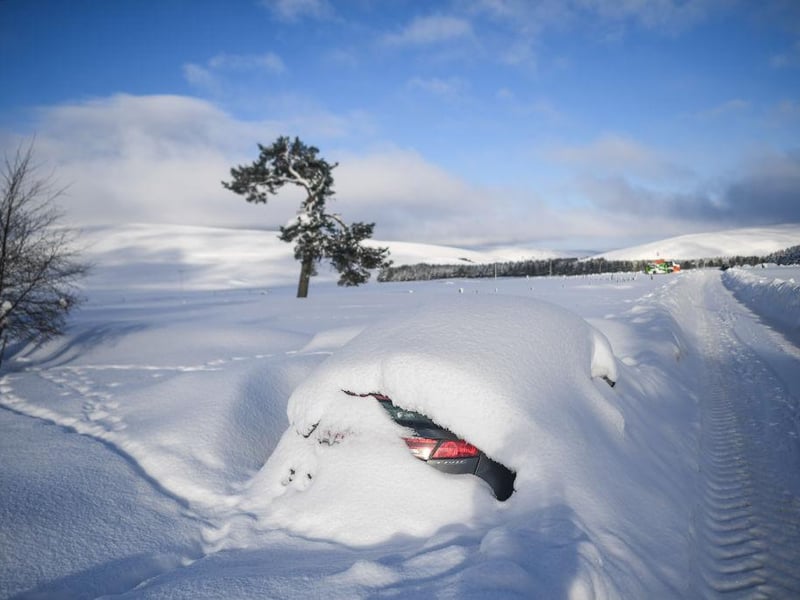 The heavy snowfall has left this car in Cabrach, Scotland, almost entirely covered.