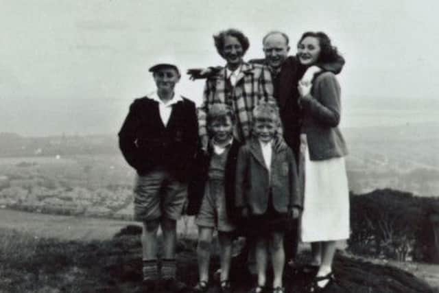 John Lennon, far left, with David Birch and family. Picture: Contributed