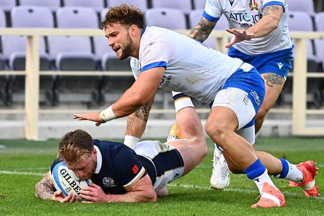 Scotland captain Stuart Hogg grounds the ball over his own line during the Autumn Nations Cup win over Italy in Florence.