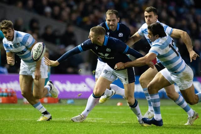 Finn Russell's ability to offload under pressure was key to Scotland's win over Argentina. (Photo by Ross Parker / SNS Group)