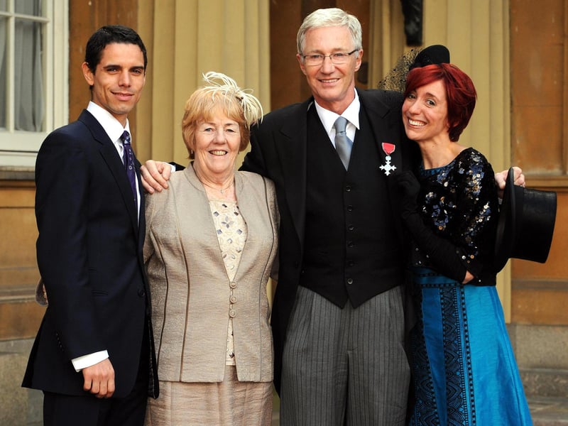 Paul O'Grady with his partner, Andre Portasio (left), sister Sheila Rudd and daughter Sharyn Mousley at Buckingham Palace, where he was made a Member of the Order of the British Empire.