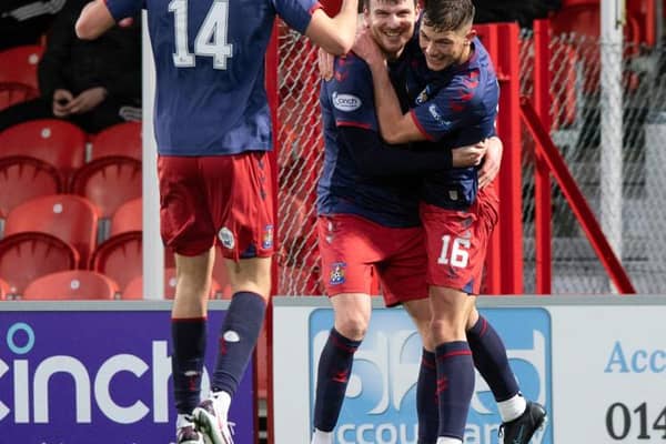 Kilmarnock's Chris Stokes (centre) celebrates making it 2-1 with Callum Hendry. (Photo by Sammy Turner / SNS Group)