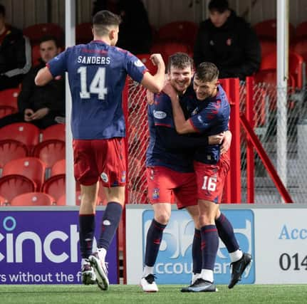 Kilmarnock's Chris Stokes (centre) celebrates making it 2-1 with Callum Hendry. (Photo by Sammy Turner / SNS Group)