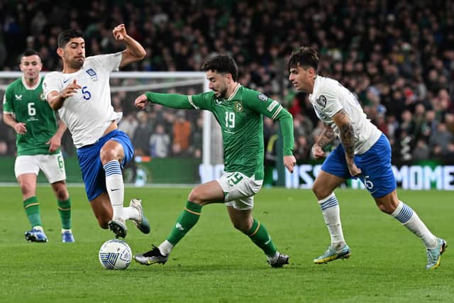 Celtic's Mikey Johnston will start for Republic of Ireland against Gibraltar.
