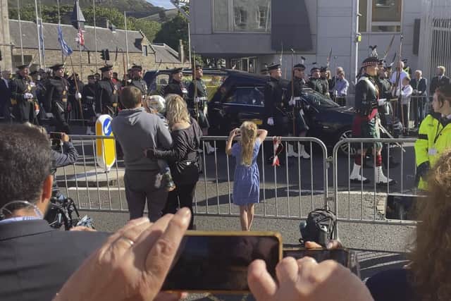 Crowds of people lined Edinburgh's Royal Mile to pay tribute to the Queen as her body was taken in a procession from the Palace of Holyrood to St Giles Cathedral, where she lay in state overnight. Picture: Ilona Amos