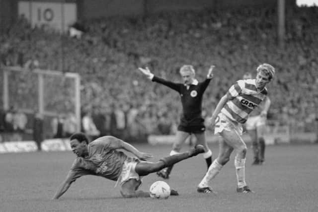 Rangers' new signing Mark Walters is brought down by Celtic Chris Morris during his first Old Firm match at Parkhead. Picture: PA