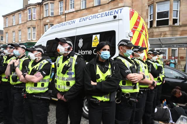 Police say they do not enforce immigration action, and can only police the protest.