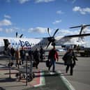 Flybe entered into administration. (Photo by OLI SCARFF/AFP via Getty Images)