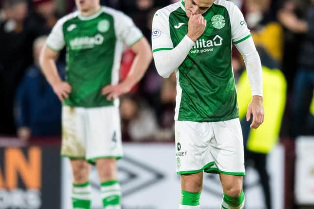 Kyle Magennis, right, can't hide his dejection after Hibs' latest defeat.