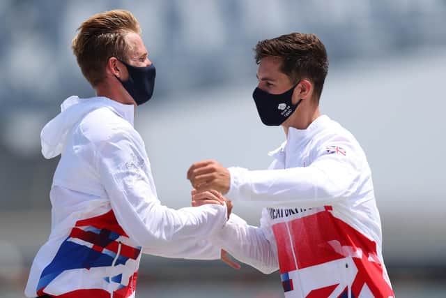 Silver medallists Harry Leask and Angus Groom celebrate after their second place in the Olympic men's quadruple sculls final in Tokyo. Picture: Naomi Baker/Getty Images
