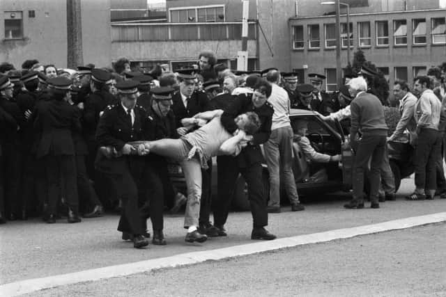 Members of the NUM miners' union picket line clash with police outside Bilston Glen colliery during the miners' strike in June 1984 (Picture: Albert Jordan)