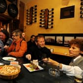 Food flows along with the wine at tapas bars like this one in Madrid (Picture: Jasper Juinen/Getty Images)