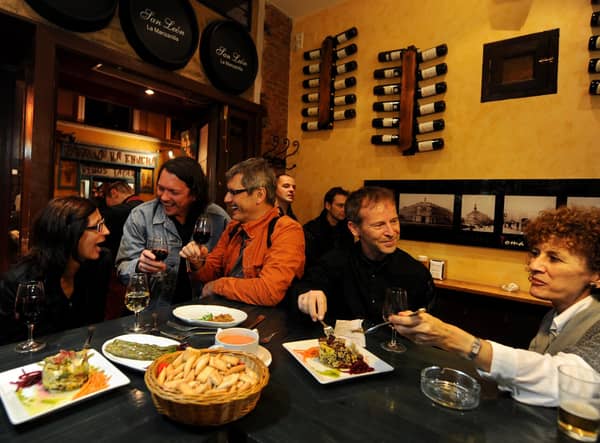 Food flows along with the wine at tapas bars like this one in Madrid (Picture: Jasper Juinen/Getty Images)