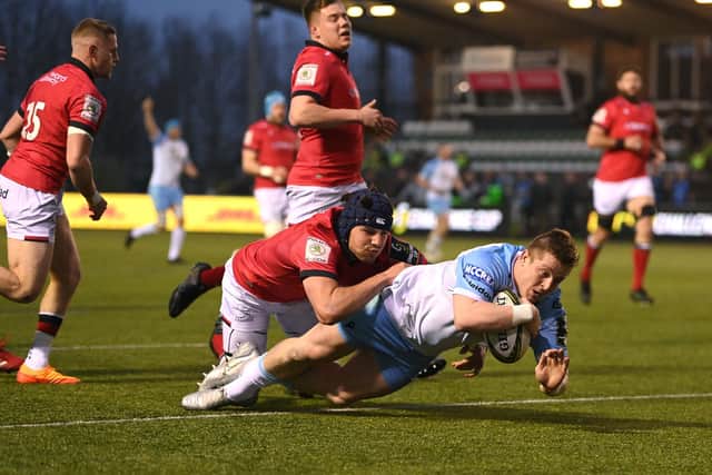 Glasgow Warriors hooker Johnny Matthews dives over for the game's opening try against Newcastle Falcons. (Photo by Stu Forster/Getty Images)