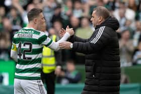 Celtic manager Ange Postecoglou shakes hands with captain Callum McGregor.  (Photo by Craig Williamson / SNS Group)