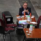 Alba Party leader Alex Salmond on his phone as votes are being counted for the Scottish Parliamentary Elections at the P&J Live/TECA, Aberdeen. PIC: PA.
