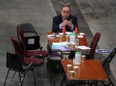 Alba Party leader Alex Salmond on his phone as votes are being counted for the Scottish Parliamentary Elections at the P&J Live/TECA, Aberdeen. PIC: PA.