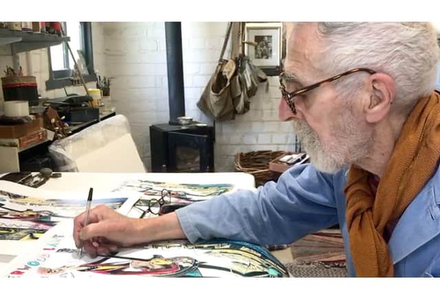 John Byrne in his studio, working on poster designs for his new play Underwood Lane