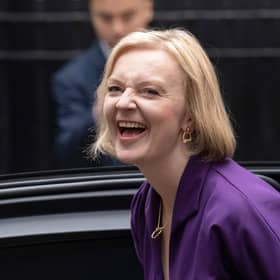 Labour Chancellor Rachel Reeves is taking a very different approach to Liz Truss, pictured on her first day as Conservative leader, (Picture: Carl Court/Getty Images)
