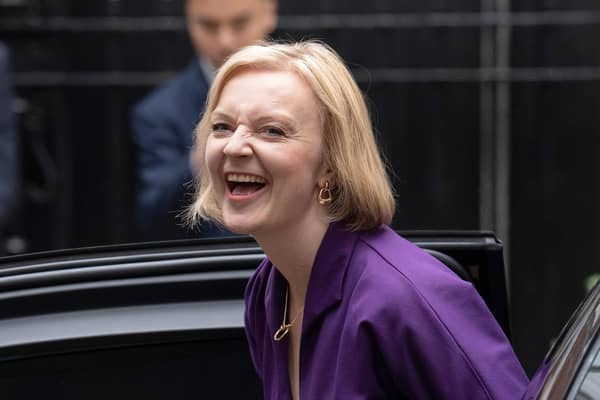 Labour Chancellor Rachel Reeves is taking a very different approach to Liz Truss, pictured on her first day as Conservative leader, (Picture: Carl Court/Getty Images)