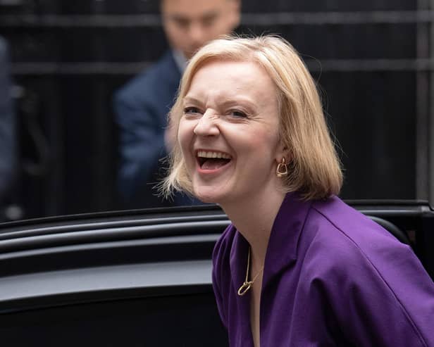 Labour Chancellor Rachel Reeves is taking a very different approach to Liz Truss, pictured on her first day as Conservative leader, (Picture: Carl Court/Getty Images)