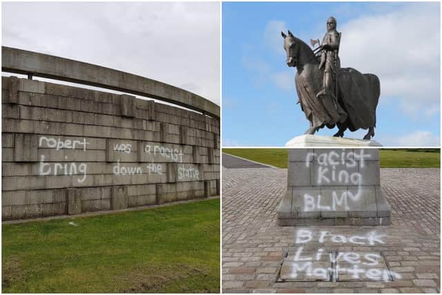 The statue of King Robert the Bruce at Bannockburn has been graffitied with messages calling for the monument to be removed.