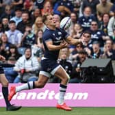 Scotland's Duhan van der Merwe juggles the ball before running through to score his first try against Georgia at Scottish Gas Murrayfield.  (Photo by Ross MacDonald / SNS Group)