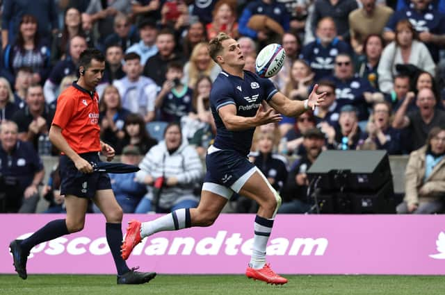 Scotland's Duhan van der Merwe juggles the ball before running through to score his first try against Georgia at Scottish Gas Murrayfield.  (Photo by Ross MacDonald / SNS Group)