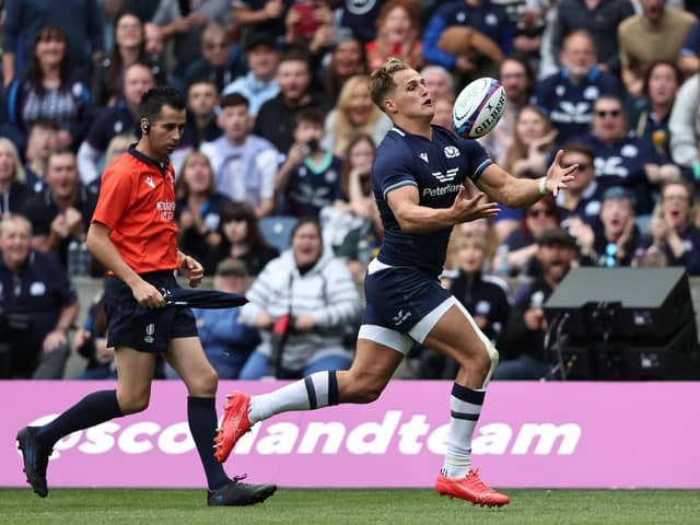Scotland's Duhan van der Merwe juggles the ball before running through to score his first try against Georgia at Scottish Gas Murrayfield.  (Photo by Ross MacDonald / SNS Group)