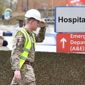 Military personnel outside St Thomas' Hospital, in central London, as the UK continues in lockdown to help curb the spread of the coronavirus.