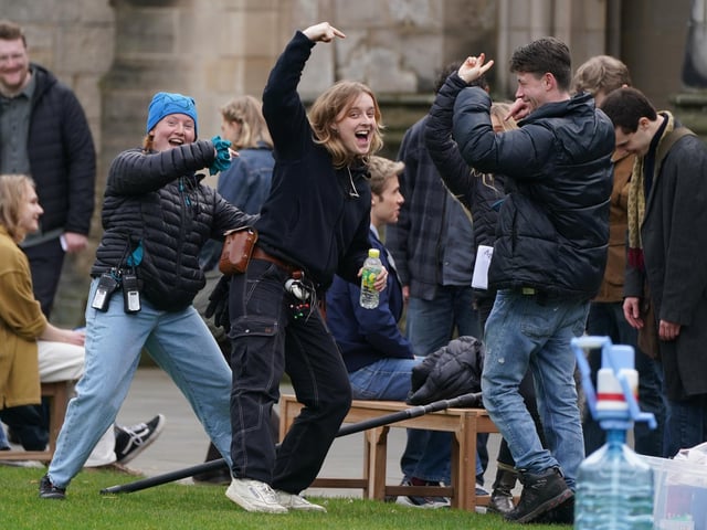 Cast and crew members on set as they film scenes for the next season of The Crown in St Andrews