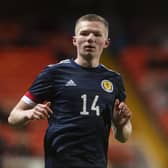Stephen Kelly put Scotland Under-21s ahead against Denmark.