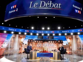 French President and La Republique en Marche (LREM) party candidate for re-election Emmanuel Macron (L) and   French far-right party Rassemblement National (RN) presidential candidate Marine Le Pen (R) Photo by Ludovic Marin AFP via Getty Images
