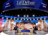 French President and La Republique en Marche (LREM) party candidate for re-election Emmanuel Macron (L) and   French far-right party Rassemblement National (RN) presidential candidate Marine Le Pen (R) Photo by Ludovic Marin AFP via Getty Images