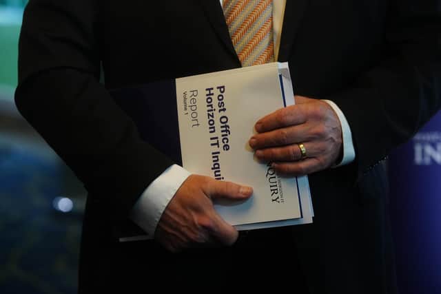 A copy of the first volume of the final report of the Horizon Inquiry. PIC: Jeff Moore/PA Wire