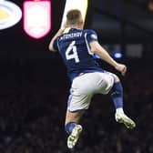 Scott McTominay celebrates scoring his opener in the 2-0 win over Spain on Tuesday (Photo by Ross MacDonald / SNS Group)