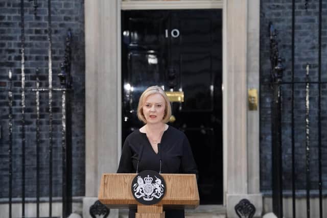 Former Prime Minister Liz Truss reading a statement outside 10 Downing Street