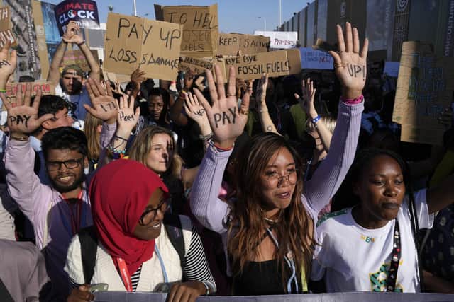 Climate activists march in Sharm El-Sheikh during a demonstration at the Unite Nation COP27 climate summit. Photo: Peter Dejong/AP