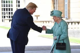 Donald Trump is greeted by Queen Elizabeth II at Buckingham Palace during his previous state visit in June 2019 (Picture: Victoria Jones/WPA Pool/Getty Images)