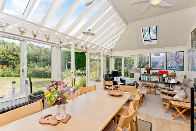 The spacious garden room brings in plenty of light