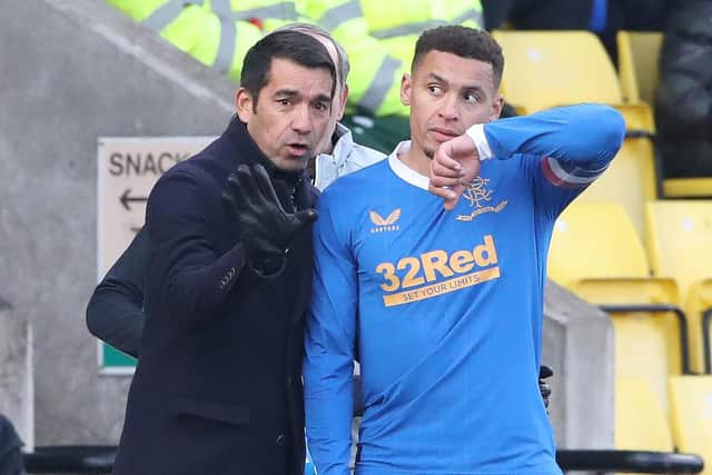 Rangers manager Giovanni van Bronckhorst gives instructions to James Tavernier . (Photo by Ian MacNicol/Getty Images)