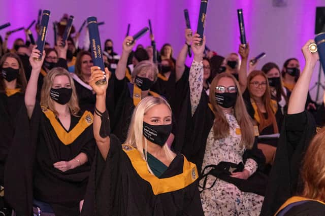 Two hundred mask-wearing graduates and special guests gathered at West Lothian College while 300 family members and friends watched the ceremony live on big screens.