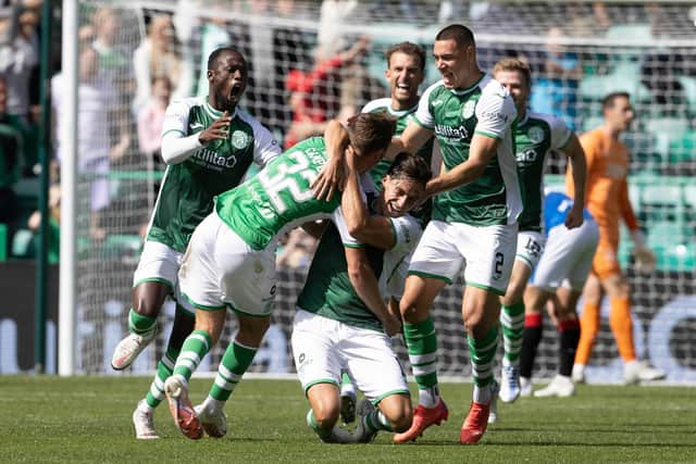 Hibs celebrate Josh Campbell's stoppage-time equaliser.