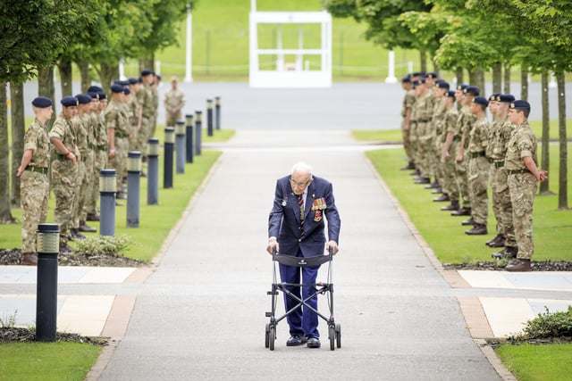 Captain Sir Tom Moore walking down a guard of honour during a visit to the Army Foundation College in Harrogate, North Yorkshire as part of his new role as Honorary Colonel of the Northern military training establishment.
