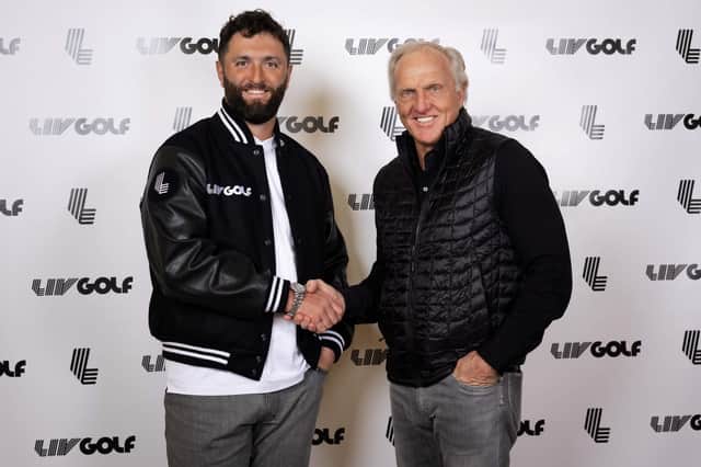 Two-time major winner Jon Rahm shakes on his big-money deal with LIV Golf CEO and Commissioner Greg Norman. Picture: LIV Golf