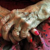 The hands of a resident at a nursing home. Picture: John Stillwell/PA Wire