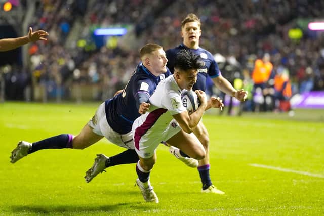 Marcus Smith scores England's try at the beginning of the second half in the Six Nations encounter against Scotland.