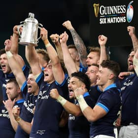Jamie Ritchie of Scotland lifts the Calcutta Cup last year.