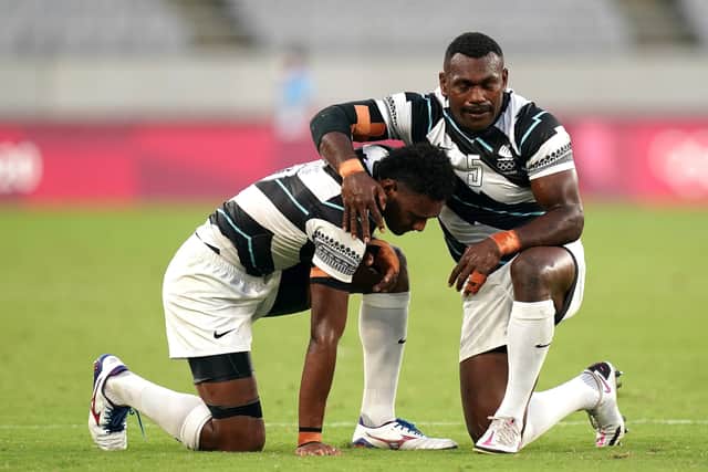 Fiji's Asaeli Tuivuaka (right) celebrates with team-mate after victory in the Men's Rugby Seven Gold Medal Final match (Picture: Adam Davy/PA Wire)
