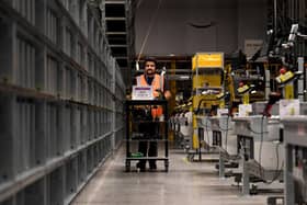 Tour of new £500m Amazon fulfilment centre on outskirts of Leeds. Workers pictured in the factory. Picture taken by Yorkshire Post Photographer Simon Hulme